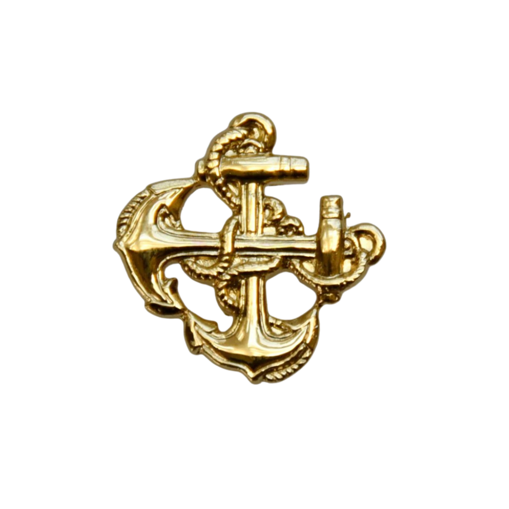 Gold anchor pin on a white background